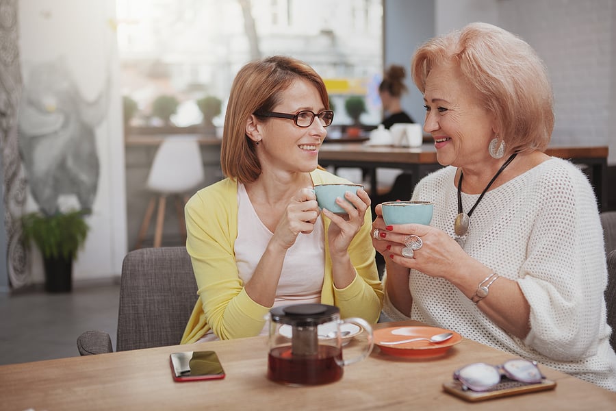 bigstock-Senior-Woman-Meeting-Her-Matur-398703551