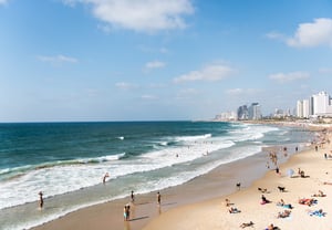 ocean coast blue waters and city on the beach